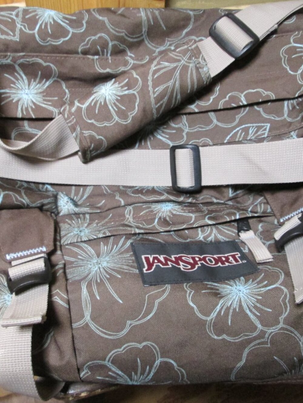Jan Sport carryon with shoulder strap overnight bag 24 in brown blue floral